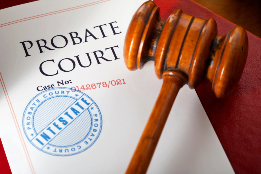 A probate attorney discussing a case with a client in a law office.