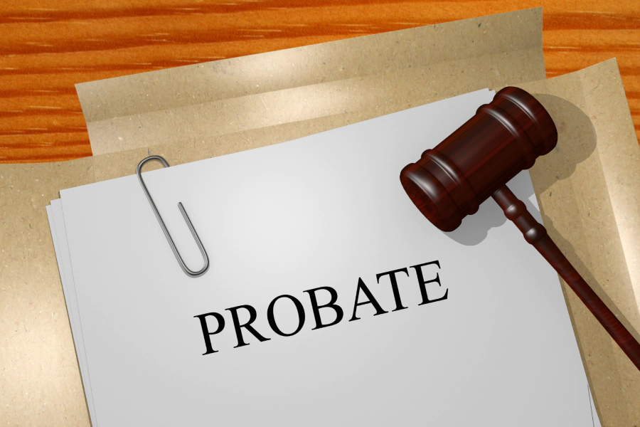 probate papers with a gavel on a wooden table